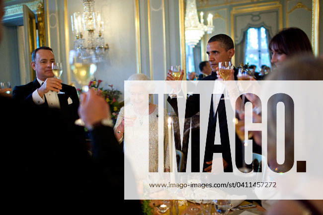 Toasts at Winfield House President Barack Obama offers a toast to Queen Elizabeth II during a dinner held in the Queen s honor at Winfield House in London, England, May 25, 2011. Actor Tom Hanks is pictured at left. Mandatory Credit: Pete Souza - White House via CNP London England