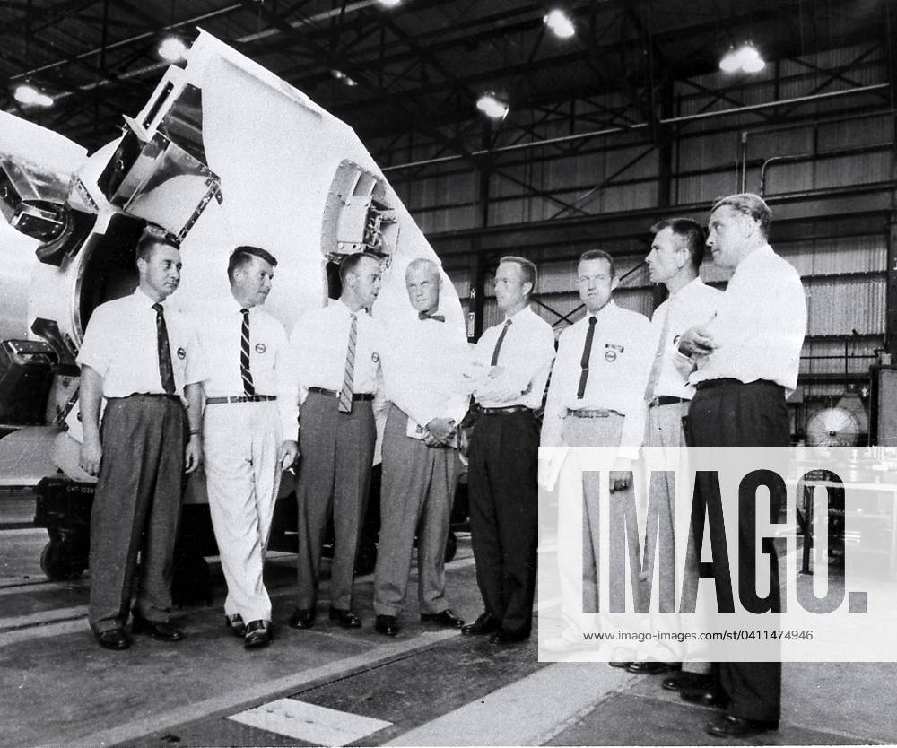 Von Braun Briefs Astronauts Dr. Wernher von Braun, Director of the U.S. Army Ballistic Missile Agency s (ABMA) Development Operations Division, is shown briefing the seven original Mercury astronauts in ABMA s Fabrication Laboratory. (Left to right) Guss Grissom, Walter Schirra, Alan Shepard, John Glenn, Scott Carpenter, Gordon Cooper, Donald Slayton, and Dr. von Braun. Credit: NASA via CNP Huntsville Alabama United States of America