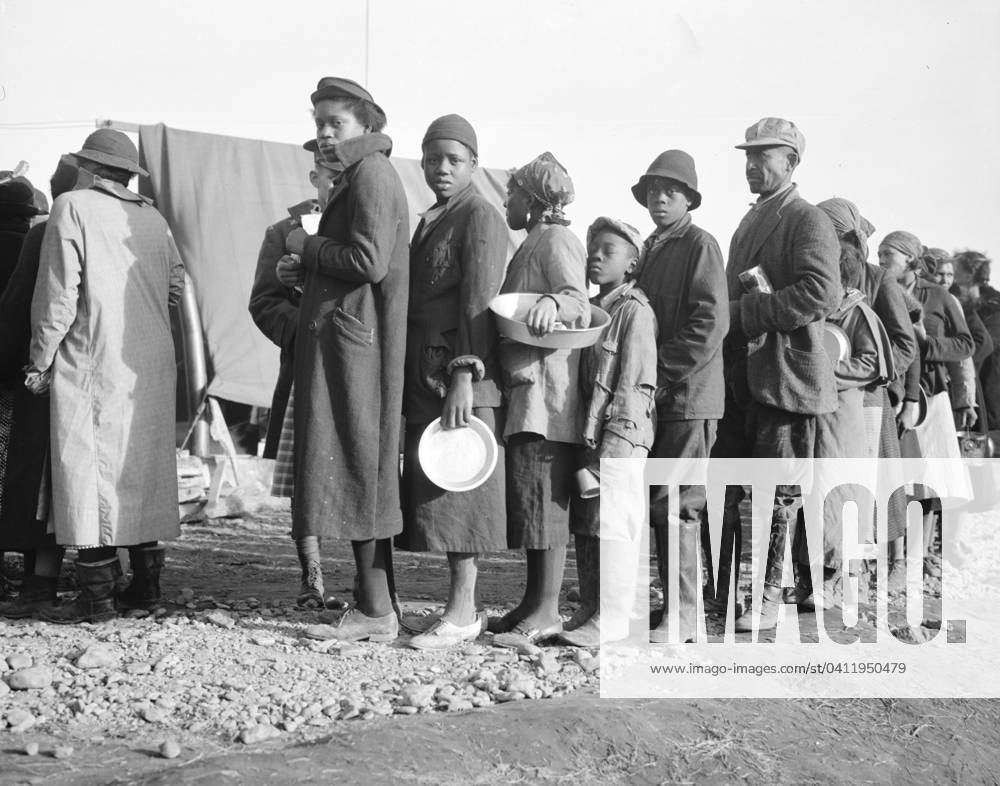 African Americans waiting for food in the Forrest City, Arkansas, 1937 1128855 African Americans waiting for food in the Forrest City, Arkansas, 1937 by Evans, Walker (1903-75); Private Collection; (add.info.: Walker Evans Farm Security Administration B&W - Office of War Information Photograph Collection).