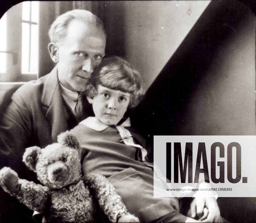 A. A. Milne (1882-1956) and his son Christopher Robin (b.1920) with Winnie-the-Pooh, 1926 (b w photo) XJF119840 A. A. Milne (1882-1956) and his son Christopher Robin (b.1920) with Winnie-the-Pooh, 1926 (b w photo) by Coster, Howard (1885-1959); Private Collection; (add.info.: by Howard Coster). Please note: The artwork in this photograph is in copyright. It is your responsibility to ensure this additional copyright is cleared prior to use. Please contact Bridgeman Images if you require further information on the copyright handler.