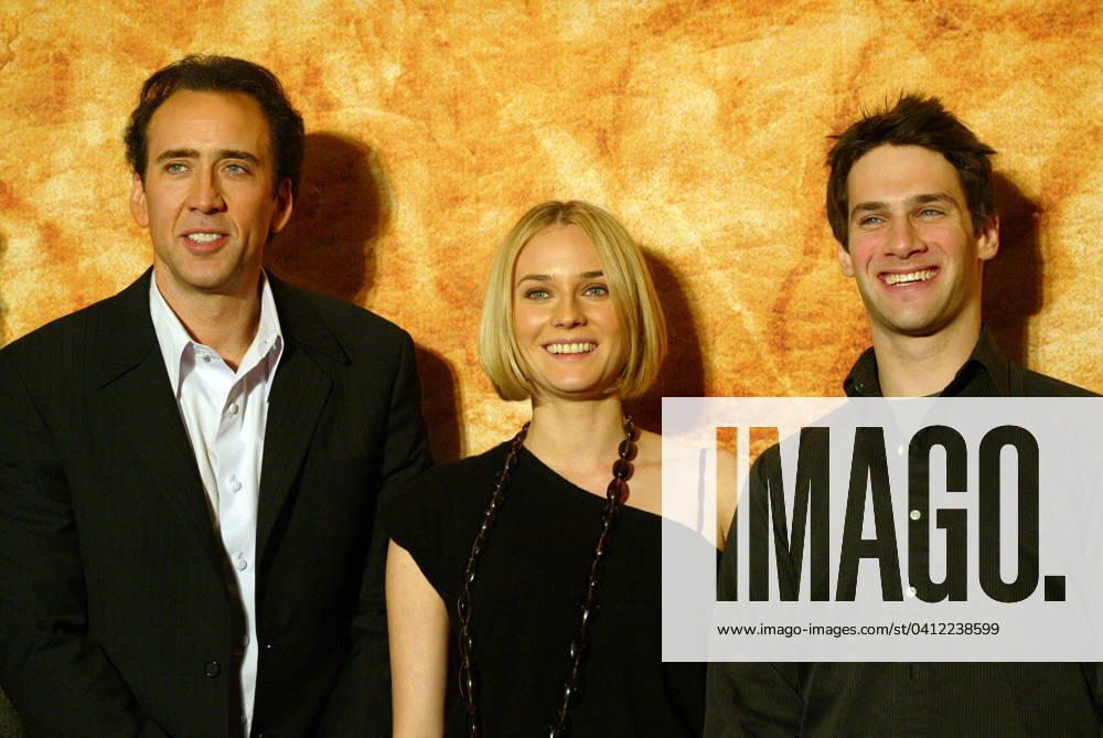 Actors Nicolas Cage, Diane Kruger and Justin Bartha speaks to journalists during apress conference to promote the movie National Treasure in Seoul, Korea Dec 13, 2004. (Jangwook Kim iPhoto.ca) JKT12130410 Seoul, Korea Seoul, Korea