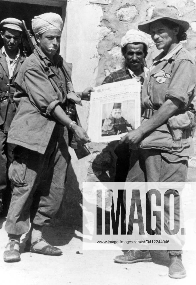 MNA algerian nationalist rebels (MessaliHadj s party) with portrait of their leader Messali Hadj August 17, 1959 in Algeria during the war 1702290 MNA algerian nationalist rebels (MessaliHadj s party) with portrait of their leader Messali Hadj August 17, 1959 in Algeria during the war; (add.info.: MNA algerian nationalist rebels (MessaliHadj s party) with portrait of their leader Messali Hadj august 17, 1959 in Algeria during the war).