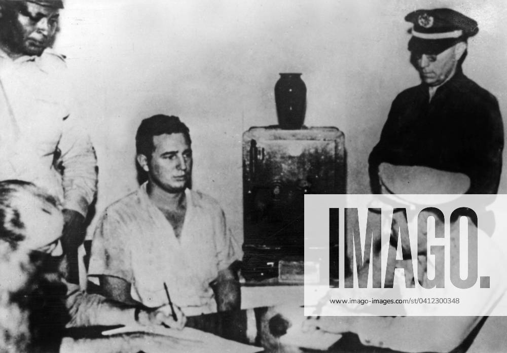 Fidel Castro during his interrogation after the attack of the Moncada barracks in Santiago de Cuba, 26th July 1953 (b w photo) 1717735 Fidel Castro during his interrogation after the attack of the Moncada barracks in Santiago de Cuba, 26th July 1953 (b w photo); (add.info.: Fidel Castro (b. 1926) Cuban politician and revolutionary. This led to the creation by Fidel Castro of 26th of July Movement or M-26-7.).