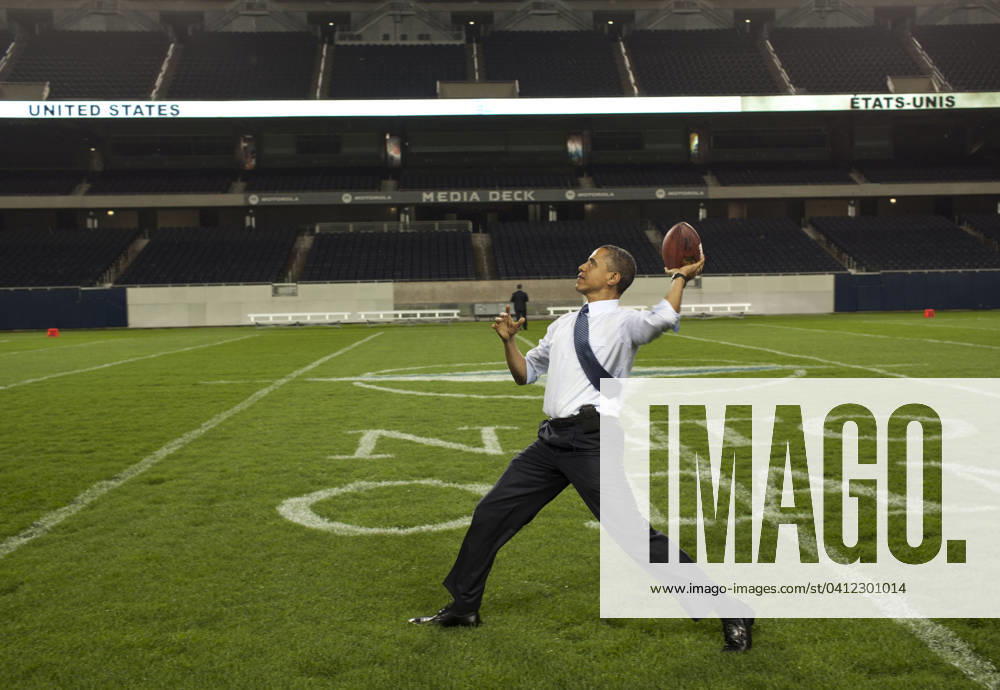 Set to Pass United States President Barack Obama throws a football on the field at Soldier Field following the NATO working dinner in Chicago, Illinois, Sunday, May 20, 2012. Mandatory Credit: Pete Souza - White House via CNP Chicago Illinois United States of America