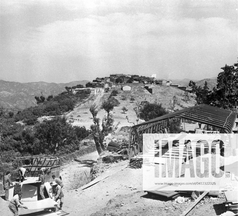 Building of Schoolsinfra After Operation Jumelles, Kabylia, Algeria, 24th August 1959 (b w photo) 1741701 Building of Schoolsinfra After Operation Jumelles, Kabylia, Algeria, 24th August 1959 (b w photo) by French Photographer (20th century); (add.info.: After operation Jumelles in Kabylia, Algeria (at time of war in Algeria) : building of schools here in a village (Tizi Mibel), august 24, 1959).