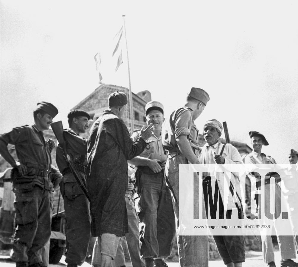 French and Portuguese Officers, Operation Jumelles in Kabylia, Algeria, August 1959 (b w photo) 1741702 French and Portuguese Officers, Operation Jumelles in Kabylia, Algeria, August 1959 (b w photo) by French Photographer (20th century); (add.info.: Operation Jumelles in Kabylia, Algeria (at time of war in Algeria) here in a village (Tizi Mibel), august 24, 1959 : french officers (Georges Oudinot) with portuguese officers).