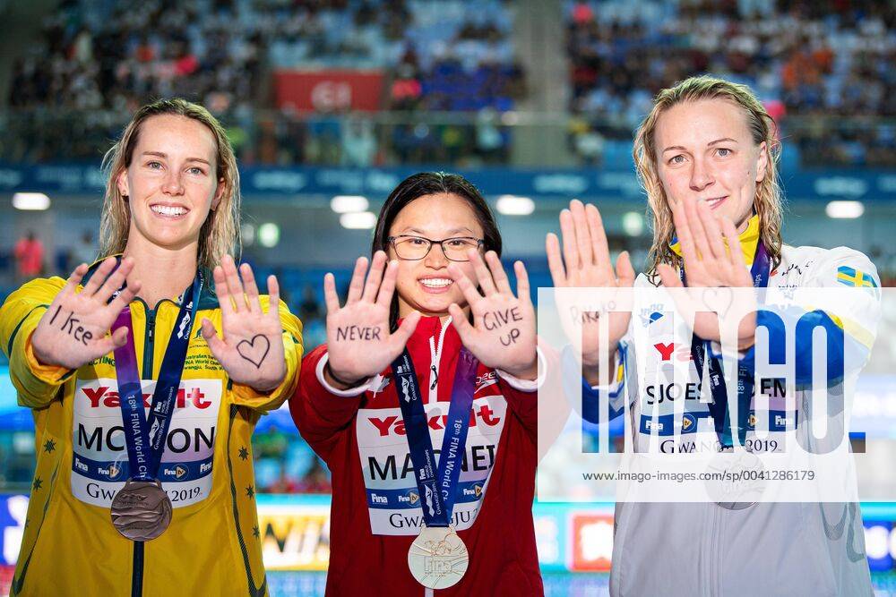 Emma McKeon of Australia bronze , Margaret MacNeil of Canada gold and Sarah Sjöström of Sweden silver pose with a message for Japanese swimmer Rikako Ikee who is sick in leukaemia, after the final of women s 100 meter butterfly swimming during the FINA World Championships on July 22, 2019 in Gwangju Photo Joel Marklund BILDBYRAN kod JM 87996 BBENG FINA World Championships FINA World Championships 2019 VM sim VM simning swimming final dam Sverige Sweden Kanada Canada Australia Australien Rikako Ikee Japan leukemia leukemi cancer,