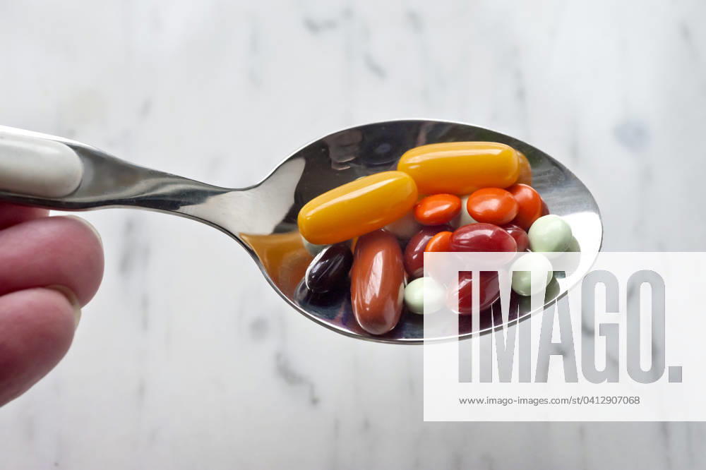 Dietary supplements are food 20240210ad708 medication medicine drug drug deficiency pharmacy remedy pharmaceutical preparation disease tablets pharmacy, pharmaceutical industry health care, pills health products additional vitamins minerals spoon tablespoon Hamburg Hamburg Germany Germany