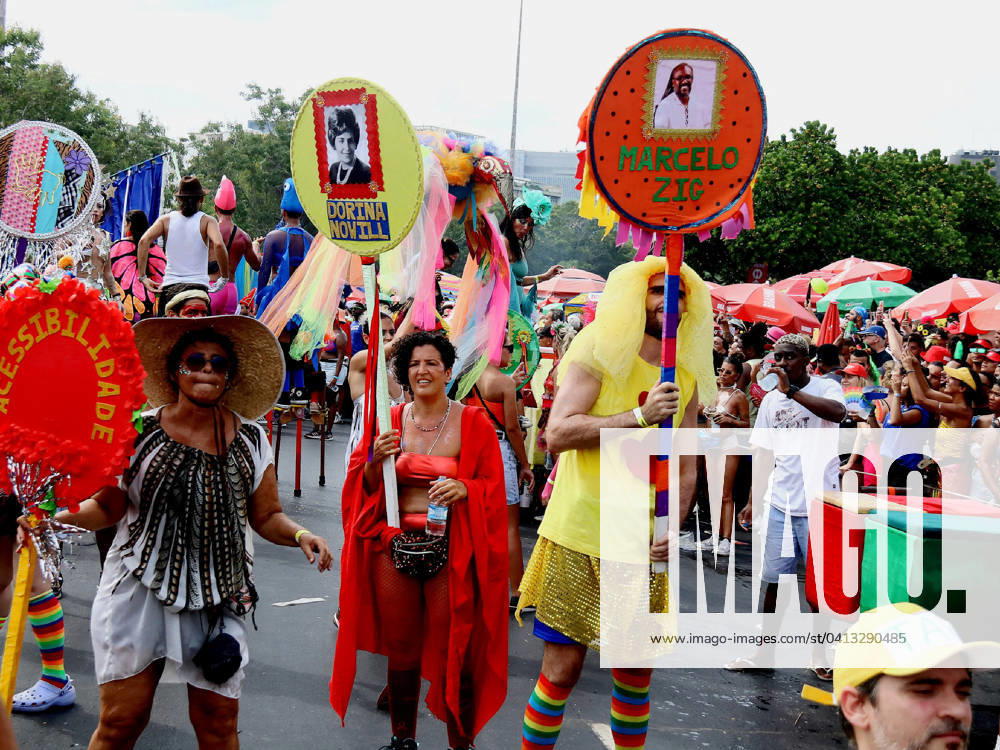 RIO DE JANEIRO, RJ - 13.02.2024: CORTEJO DA ORQUESTRA VOADORA 2024 - In its 15th CARNIVAL, the Fanfarra Orquestra Voadora, whose theme was: Debutante Carnival, attracted hundreds of revelers this Tuesday afternoon (13) at Aterro do Flamengo in the South Zone of Rio de Janeiro. With a very democratic and inclusive footprint, the Block had a wing of circus artists, performers, waders, and a wing for people with some type of disability. x2495394x AlexandrexSilva
