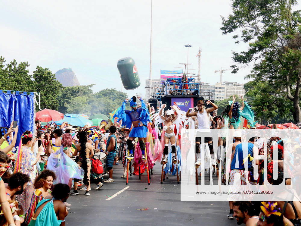 RIO DE JANEIRO, RJ - 13.02.2024: CORTEJO DA ORQUESTRA VOADORA 2024 - In its 15th CARNIVAL, the Fanfarra Orquestra Voadora, whose theme was: Debutante Carnival, attracted hundreds of revelers this Tuesday afternoon (13) at Aterro do Flamengo in the South Zone of Rio de Janeiro. With a very democratic and inclusive footprint, the Block had a wing of circus artists, performers, waders, and a wing for people with some type of disability. x2495410x AlexandrexSilva