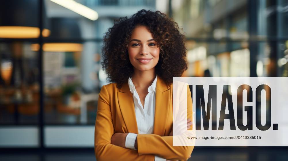Portrait of young businesswoman standing with arms crossed in office. - Generative AI