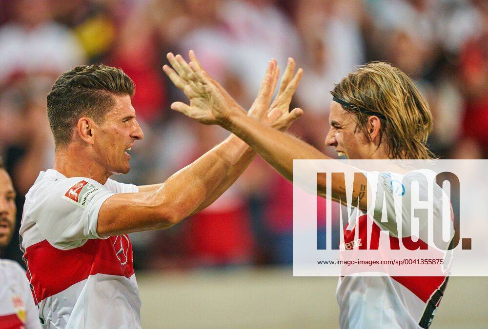KW30 Mario GOMEZ, VFB 27 celebrates his goal, happy, laugh, celebration, 1-0 with Borna SOSA, VFB 24 VFB STUTTGART - HANNOVER 96 - DFL REGULATIONS PROHIBIT ANY USE OF PHOTOGRAPHS as IMAGE SEQUENCES and or QUASI-VIDEO - DFL 2.German Soccer League , Stuttgart, July 26, 2019, Season 2019 2020, matchday 01, Photographer: Peter Schatz