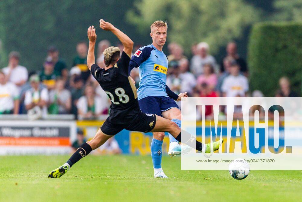 Straelen, Germany, 27 07 2019, friendly match, test match, Borussia Moenchengladbach SCO Angers, Farid El Melali Angers and Oscar Wendt Moenchengladbach in the duel Straelen Sportzentrum an der Roemerstraße Germany eu images 09 542 003577 eu-images-542