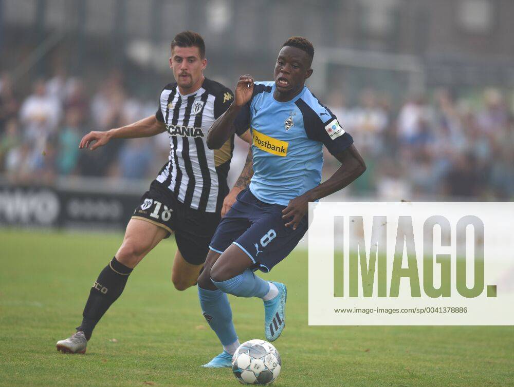 Test match Borussia Mönchengladbach SCO Angers France 27 07 2019 Denis Zakaria BMG Action in front of Baptiste Santamaria DFL REGULATIONS PROHIBIT ANY USE OF PHOTOGRAPHS AS IMAGE SEQUENCES AND OR QUASI VIDEO HM
