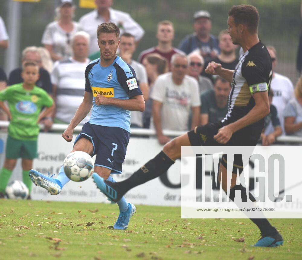 Test match Borussia Mönchengladbach SCO Angers France 27 07 2019 left Patrick Herrmann BMG shoots ahead Romain Thomas DFL REGULATIONS PROHIBIT ANY USE OF PHOTOGRAPHS AS IMAGE SEQUENCES AND OR QUASI VIDEO HM