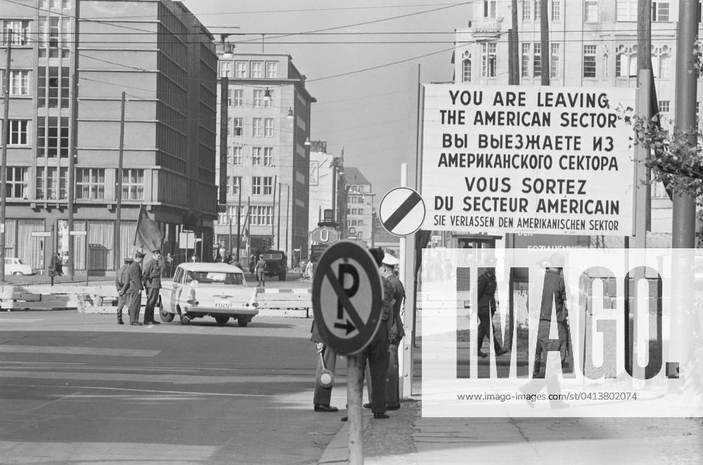 Checkpoint Charlie in West Berlin, 1961 (b w photo) 5322827 Checkpoint Charlie in West Berlin, 1961 (b w photo) by O Halloran, Thomas J. (fl.1957); Private Collection; (add.info.: You are leaving the American Sector in four languages: English, Russian, French and German).