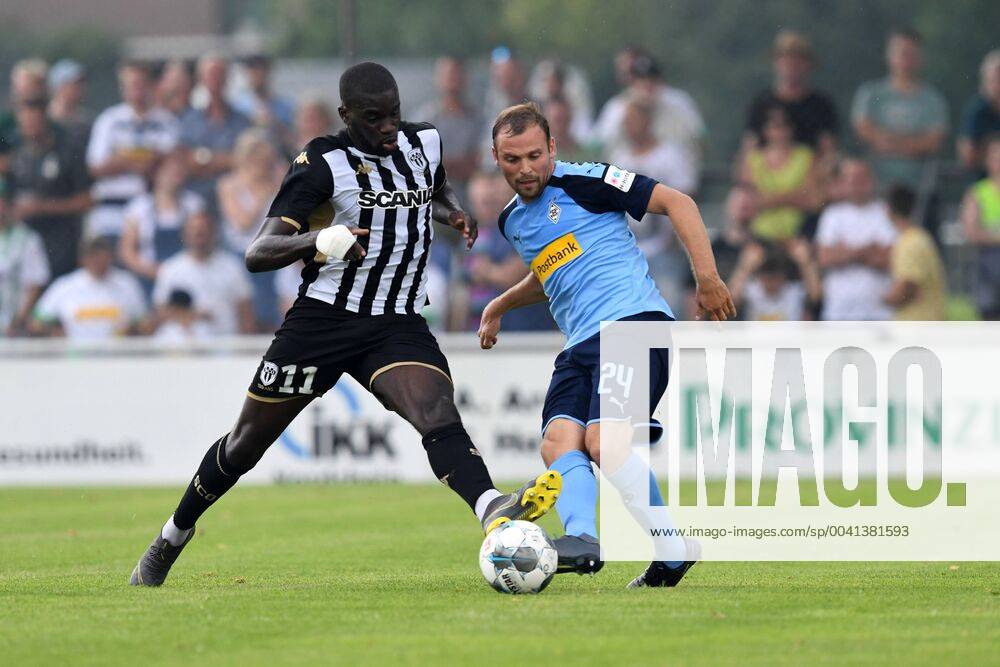 Football 1 Bundesliga Season 2019 2020 Test match SCO Angers vs Borussia Mönchengladbach , 27 07 2019, Roman Stadium Straelen,Wilfride Kanga SCO Angers Tony Jantschke, Borussia Mönchengladbach, DFL regulations prohibit any use of photographs as image sequences and or quasi video