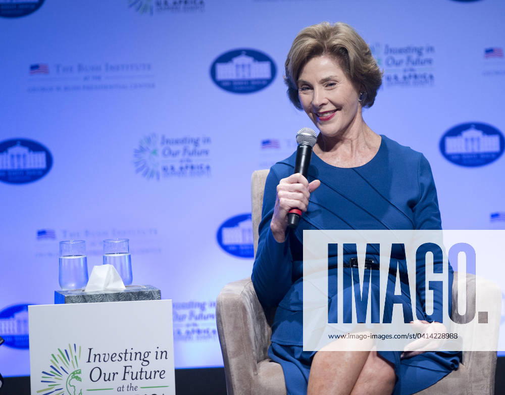 Former first lady Laura Bush participates in a conversation with first lady Michelle Obama on Investing in our Future at the U.S. - Africa Leaders Summit at the John F. Kennedy Center for the Performing Arts in Washington, D.C. on Wednesday, August 6, 2014. Credit: Ron Sachs Pool via CNP