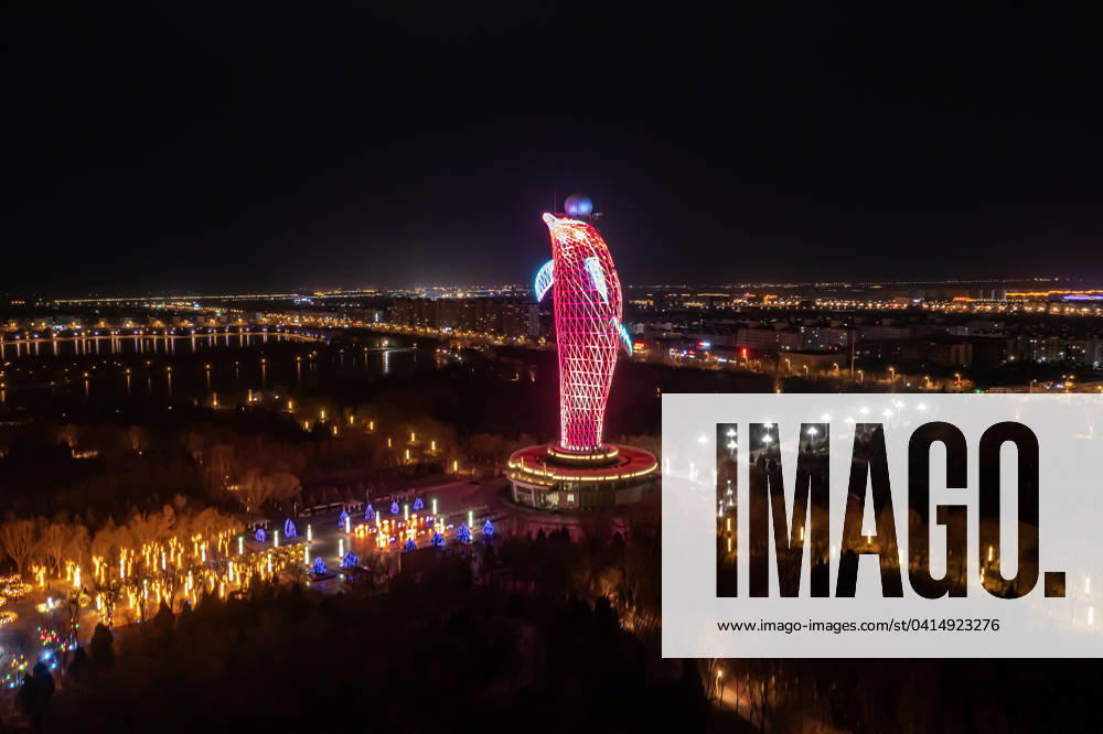 The Highest Meteorological Tower in China An aerial photo is showing the meteorological tower at night at the East Lake eco-tourism scenic spot, known as the Dolphin Tower, which is standing 94.94 meters high and is the highest meteorological tower in China, in Jiayuguan, Gansu Province, China, on February 12, 2024. Jiuquan Gansu China