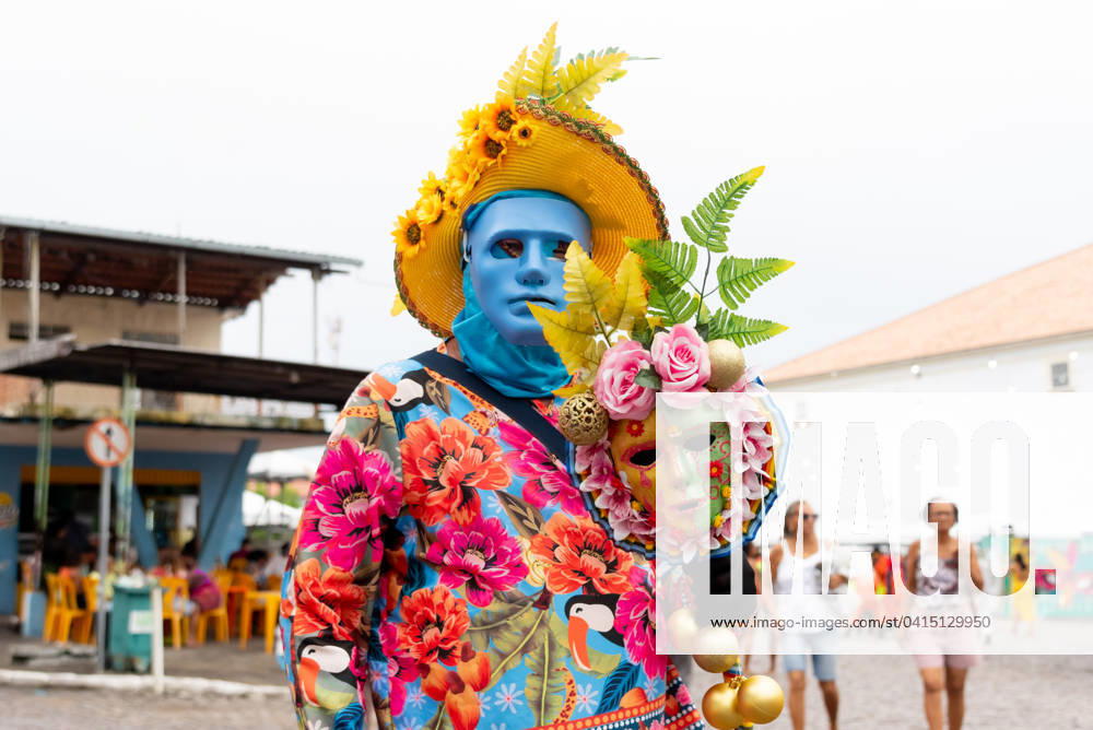 Masked people are seen having fun during carnival in the city of Maragogipe in Bahia. Maragogipe Bahia Brazil
