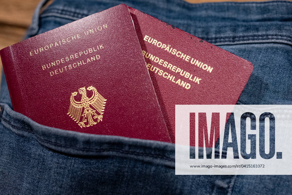 German passport in jeans pocket 18 02 24, Selters Symbol photo, illustration image, symbol image, illustration photo German passport in jeans pocket A German passport is stuck in the back pocket of a pair of jeans The passport partially sticks out, indicating the importance of travel documents and the preparation for an upcoming trip Selters Hessen Germany