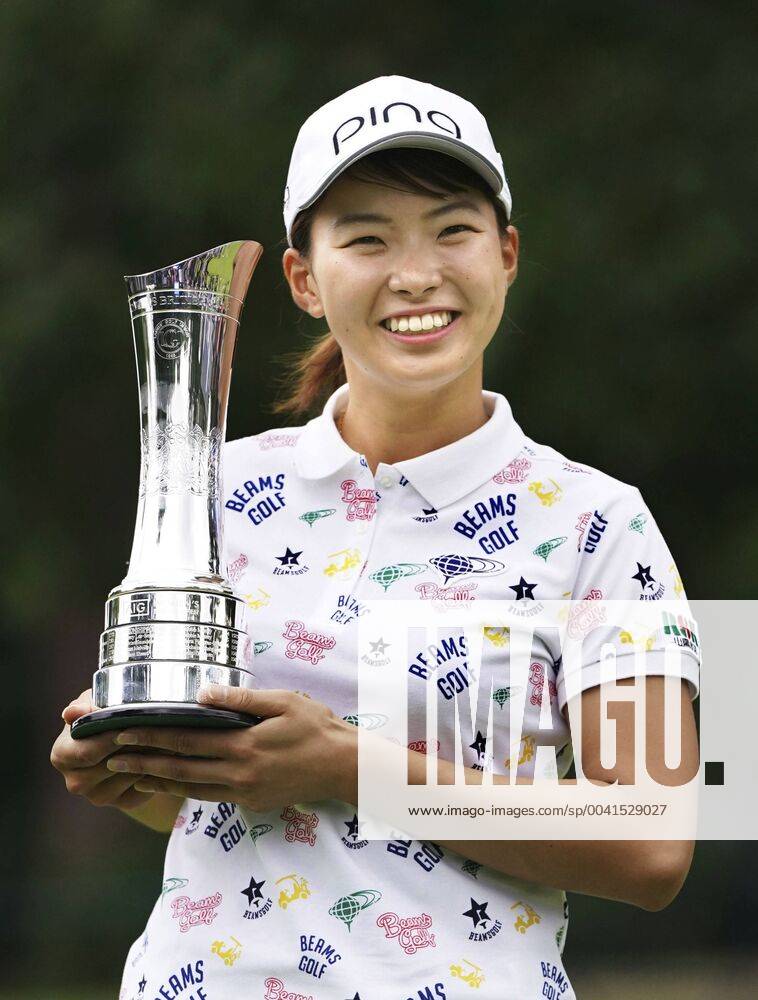 Golf: Women s British Open Hinako Shibuno of Japan smiles with the trophy after winning the Women s British Open at Woburn Golf Club in Milton Keynes, England, on Aug. 4, 2019.