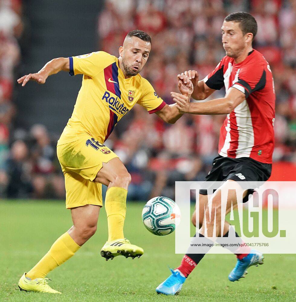 Athletic de Bilbao s Oscar de Marcos (r) and FC Barcelona, Barca s Jordi Alba during La Liga match. August 16,2019. (201908161559)