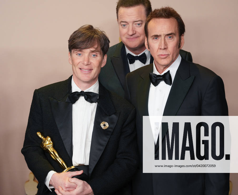 Cillian Murphy of Oppenheimer, celebrates backstage with his Oscar for Best Actor accompanied by fellow Academy Award winners including Brendan Fraser (C) and Nicolas Cage during at the 96th annual Academy Awards in Los Angeles, California, on Sunday, March 10, 2024. Since 1929, the Oscars have recognized excellence in cinematic achievements. LAP20240310869 PATxBENIC