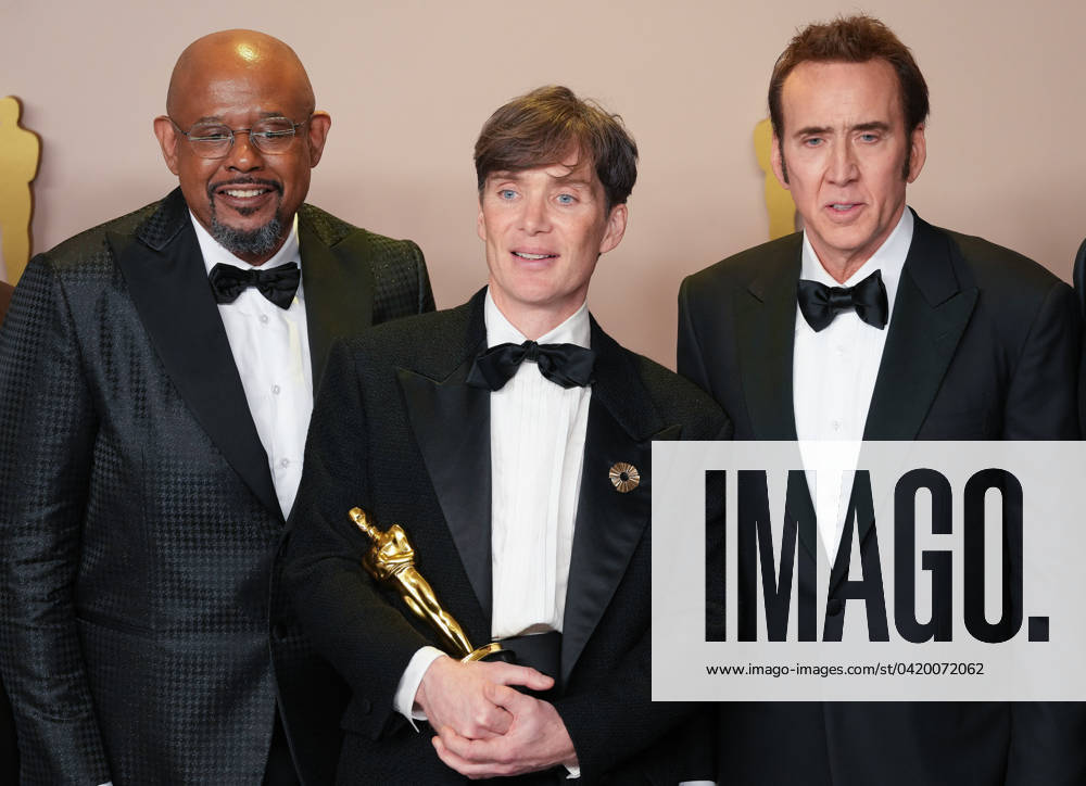Cillian Murphy (C) of Oppenheimer, celebrates backstage with his Oscar for Best Actor accompanied by fellow Academy Award winners including Forest Whitaker and Nicolas Cage during at the 96th annual Academy Awards in Los Angeles, California, on Sunday, March 10, 2024. Since 1929, the Oscars have recognized excellence in cinematic achievements. LAP20240310870 PATxBENIC