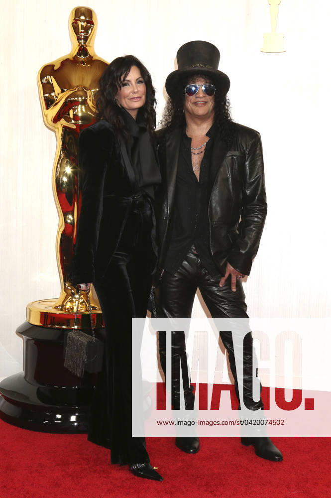 Meegan Hodges and Slash at the 2024 96th Annual Academy Awards at the Dolby Theatre Los Angeles, 10 03 2024 Foto:xJ.xFuturexImagex oscars_0744