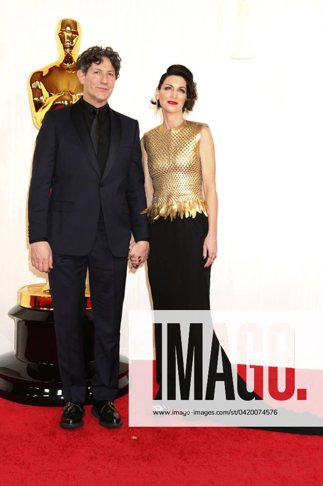 Jonathan Glazer and Rachael Penfold at the 2024 96th Annual Academy Awards at the Dolby Theatre Los Angeles, 10 03 2024 Foto:xJ.xFuturexImagex oscars_9771