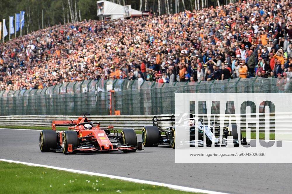Mercedes British driver Lewis Hamilton passing ahead of Ferrari s German driver Sebastian Vettel during the Spa-Francorchamps Formula One Grand Prix of Belgium race, in Spa-Francorchamps, Sunday 01 September 2019. NICOLASxLAMBERT x05653644x