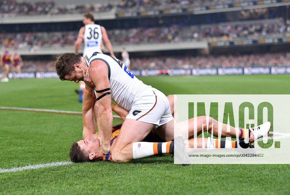 KW37 AFL LIONS GIANTS, Dayne Zorko (bottom) of the Lions is seen wrestling with Heath Shaw (top) of the Giants during the Second Semi Final match between the Brisbane Lions and the Greater Western Sydney Giants during week 2 of the AFL Finals Series at the Gabba in Brisbane, Saturday, September 14, 2019. ( NO ARCHIVING, , NO USE IN BOOKS WITHOUT CONSENT BRISBANE QLD AUSTRALIA