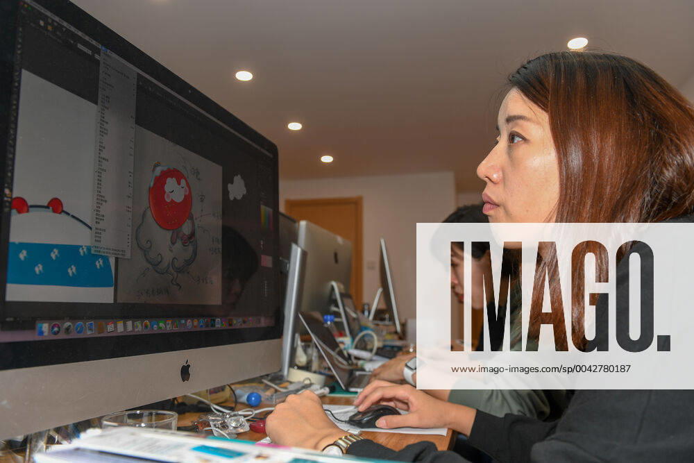 (190926) -- CHANGCHUN, Sept. 26, 2019 -- Designers work at Jilin University of Arts in Changchun, northeast China s Jilin Province on Sept. 26, 2019. Shuey Rhon Rhon, the mascot of the 2022 Paralympic Winter games, Winterspiele,Spiele, Summer games is a Chinese lantern child ready to welcome friends from around the world for a big party. Exuding positivity, the glow emanating from its heart symbolises the inspiring warmth, friendship, courage and perseverance of Para athletes that light up the dreams of millions every day. ) (SP)JILIN-CHANGCHUN-2022 PARALYMPIC WINTER GAMES-MASCOT ZhangxNan