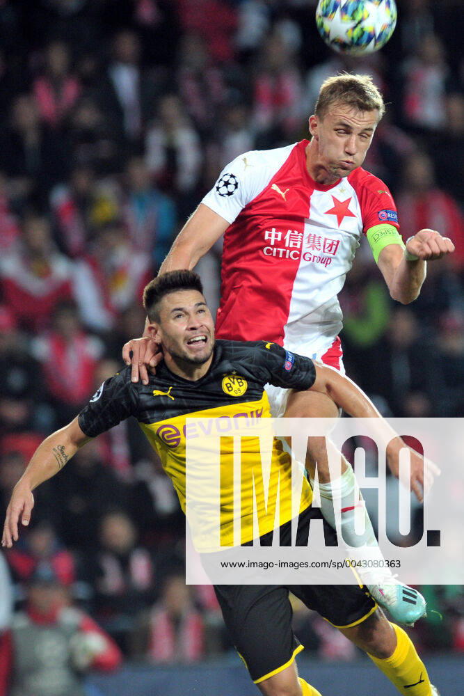Tomas Soucek captain of Slavia Prague (up) in heads duel with Raphael Guerreiro of Borussia Dortmund (down) during the UEFA Champions League group F soccer match between Slavia Prague and Borussia Dortmund in Prague, Czech Repulic, 02 October 2019. Soccer: Slavia Prague v Borussia Dortmund, UEFA Champions League, Group F - ZUMAr156 20191002_zap_r156_015