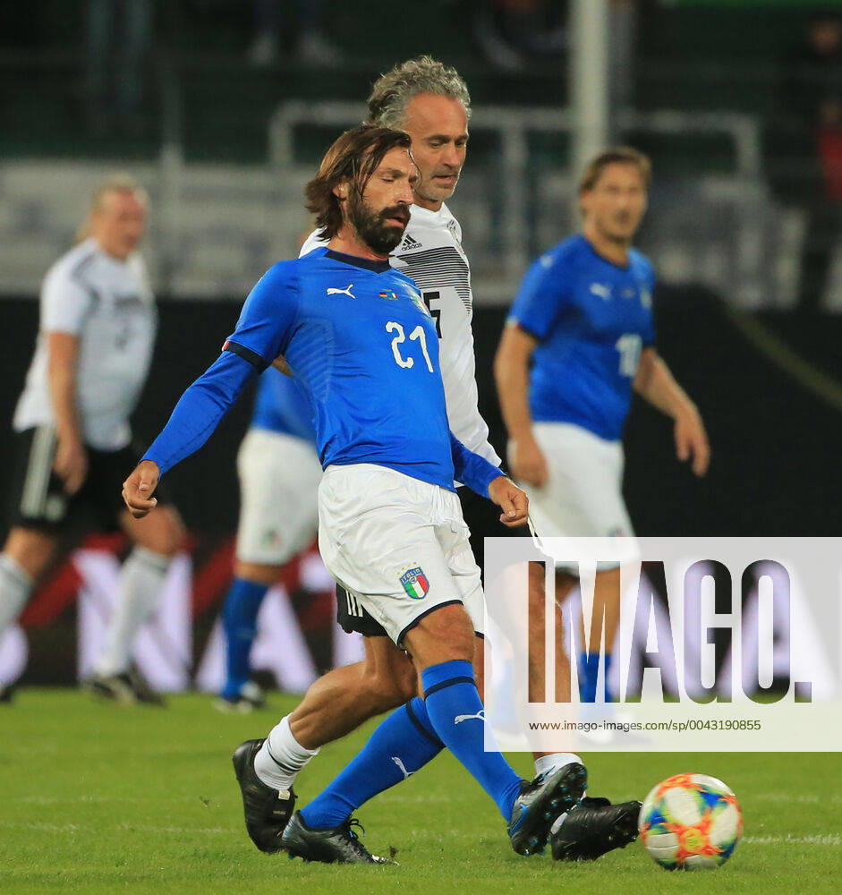 DFB All Stars vs Azzuri Legends, Sportpark Ronhof Fuerth, football, sport, in picture Andrea Pirlo Azzuri All Stars vs Maurizio Gaudino DFB All Stars