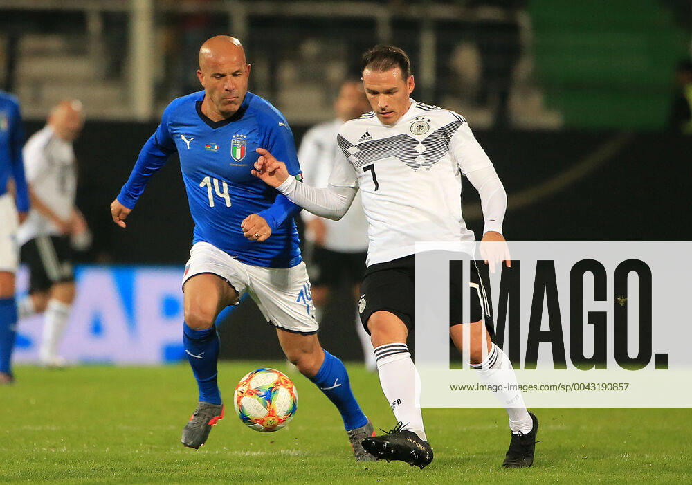 DFB All Stars vs Azzuri Legends, Sportpark Ronhof Fuerth, football, sport, in picture Luigi Di Bagio Azzuri All Stars vs Piotr Trochowski DFB All Stars
