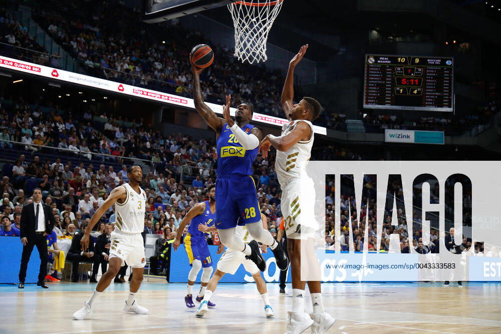 MADRID, SPAIN - OCTOBER 10: Black of United Estates and Maccabi and Walter Samuel Tavares da Veiga of Cape Verde and Real Madrid during the EuroLeague basketball match, Round 2 Regular Season Games, played between Real Madrid and Maccabi FOX at Wizink Center, on October 10, 2019 in Madrid, Spain. Basket: EuroLeague - Real Madrid v Maccabi FOX - ZUMAa181 20191010_zaa_a181_054