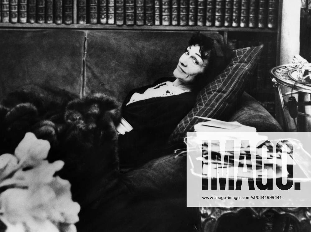 GABRIELLE COCO CHANEL (1883-1971). French fashion designer. Photographed in her home in Paris, mid 20th century.