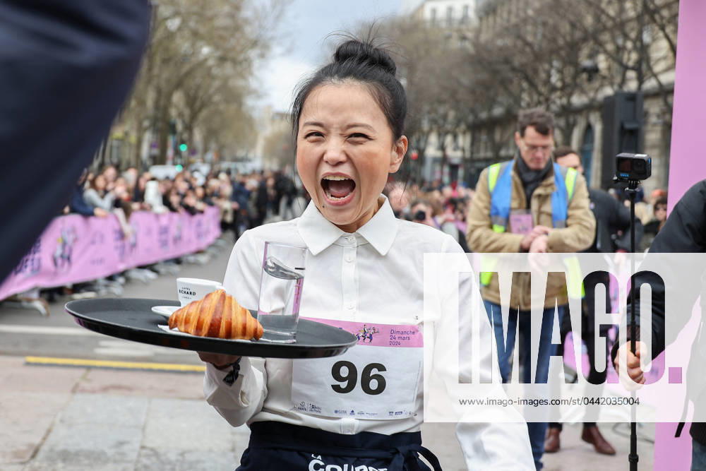 La course des cafes - The Bistro race - Paris La course des cafes The Bistro race . the waitresses and waiter runner, dressed for the occasion according to the traditional codes of Parisian bistro service, service professionals of all levels, will set off on a 2 km course looping around the Paris City Hall, and crossing part of the Marais, the historic and commercial heart of the capital. on March 24, 2024 in Paris, France. Photo by Nasser Berzane ABACAPRESS.COM Paris France