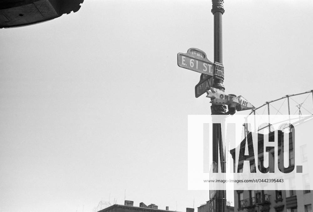 EVANS: NEW YORK, 1938. Street signs on the corner of 61st Street and 1st Avenue in New York, New York. Photograph by Walker Evans, 1938.
