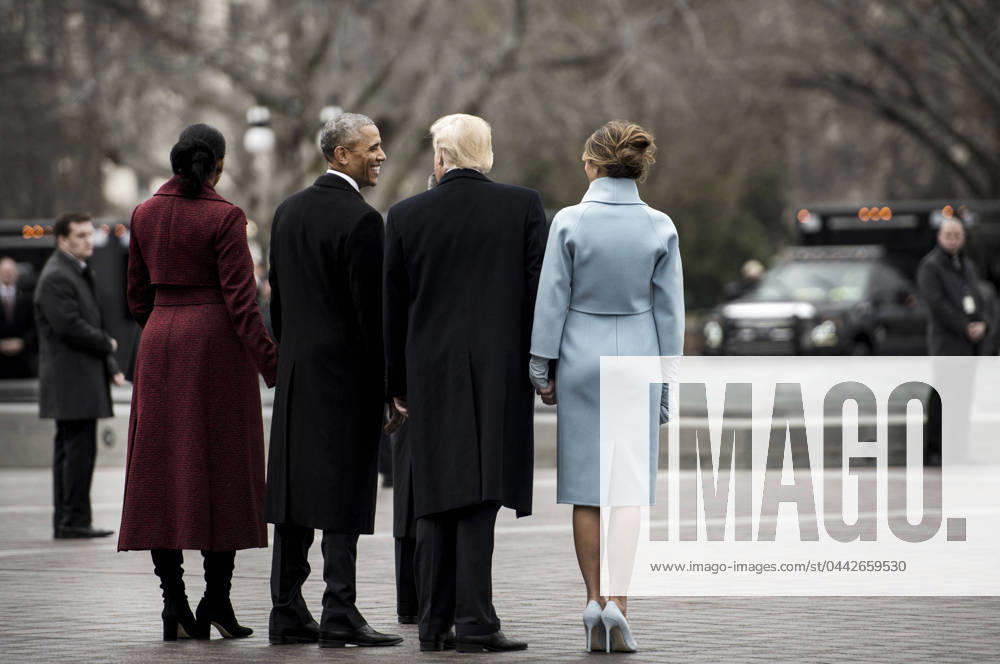 DONALD TRUMP (1946- ). 45th President of the United States. President Donald Trump, former President Barack Obama and their wives walk toward Executive One during the departure ceremony at the 58th Presidential Inauguration in Washington, D.C. Photograph