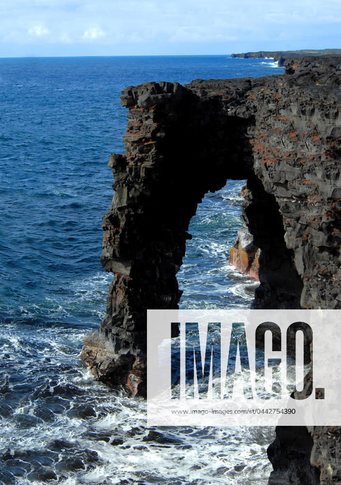 Holei Sea Arch is one among many formed by the rough waves found on the coast of Hawaii Volcanoes National Park on the Big Island.