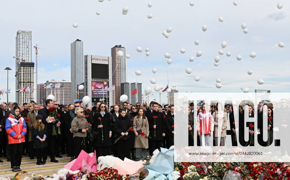 KW13 Russia Terrorist Attack Memorial Events 8652790 30.03.2024 People release white balloons near a makeshift memorial near the Crocus City Hall following a terrorist attack on the concert venue outside Moscow on March 22, Russia. Kristina Kormilitsyna Sputnik Moscow region Russia