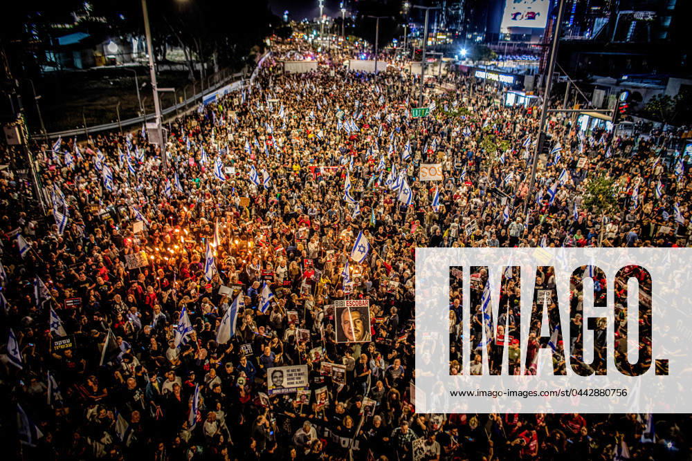 Protestors hold torches during a protest rally in Tel Aviv Saturday, March 30 2024. On Saturday, tens of thousands took to the across Israel in the largest protest since Oct 7 against the current government led by Prime Minister Benjamin Netanyahu and demanded a hostage deal with Hamas. Tel Aviv Israel - ZUMAs197 20240330_aaa_s197_291