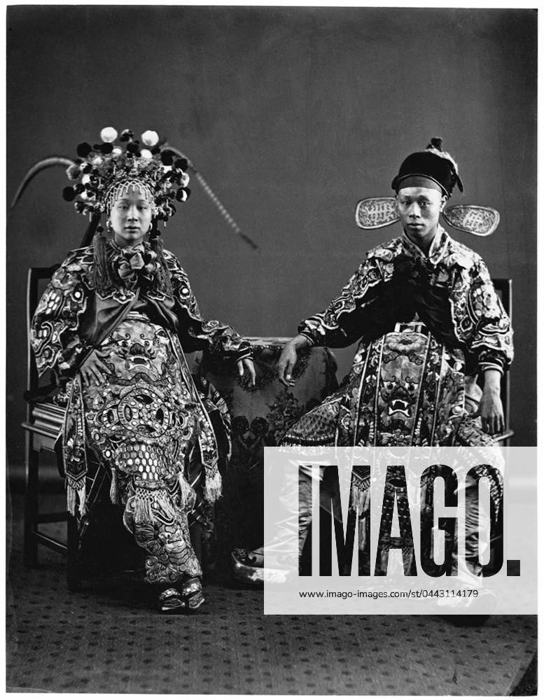 China: Two Chinese Opera actors posing in costume. John Thomson (1837-1921), c. 1870 John Thomson (14 June 1837 29 September 1921) was a pioneering Scottish photographer, geographer and traveller. He was one of the first photographers to travel to the Far East, documenting the people, landscapes and artifacts of eastern cultures.<br ><br > Thomson s travels in China were often perilous, as he visited remote, almost unpopulated regions far inland. Most of the people he encountered had never seen a Westerner or camera before. His expeditions were also especially challenging because he had to transport his bulky wooden camera, many large, fragile glass plates, and potentially explosive chemicals. He photographed in a wide variety of condi