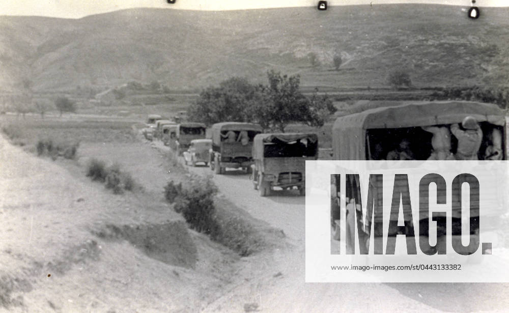 A column of military vehicles moving along a road from Sarrion towards S. Agustin. It is July 16, 1938, during the action known as Del Levante , in the course of the Spanish civil war (b w photo) 1250056 A column of military vehicles moving along a road from Sarrion towards S. Agustin. It is July 16, 1938, during the action known as Del Levante , in the course of the Spanish civil war (b w photo) by Unknown photographer, (20th century); (add.info.: Unidentified Author Spain); Fratelli Alinari Museum Collections, Florence, Italy.