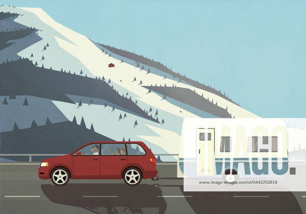 Family on vacation in car pulling camper trailer in snowy, remote mountains