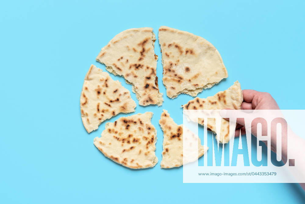 IMAGO Creative, Food, Brot, Naan brot,fladenbrot,naan,brote,fladenbrote ** bread,focaccia bread,naan,breads,focaccia breads,naans zm6-hfu ,model released, Symbolfoto