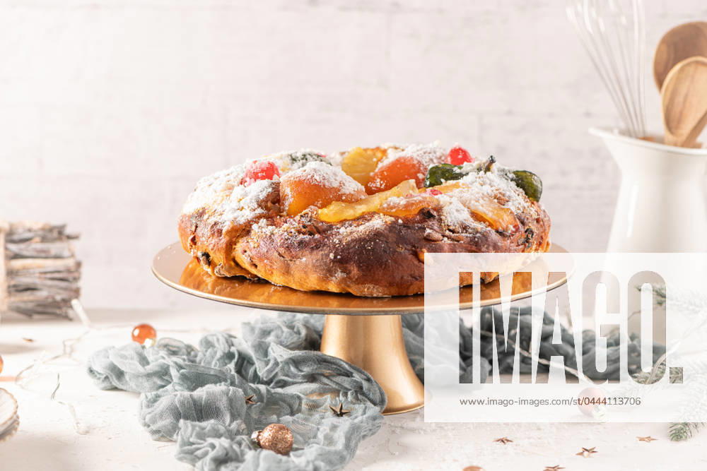 Bolo do Rei or King s Cake Bolo do Rei or King s Cake, Made for Christmas, Carnavale or Mardi Gras with Christmas season elements in Background.